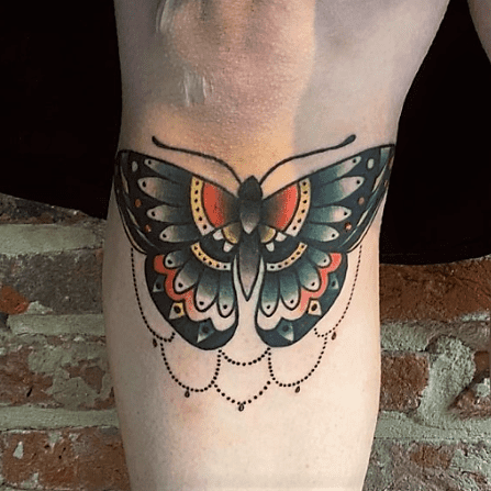 neo traditional knee vlinder tattoo