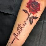tekst en roos tattoo
