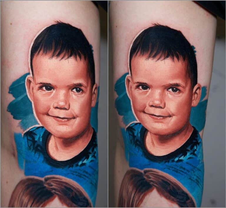Kleur realisme portret van een jongen op de binnenkant van een bovenarm. Gezet door Al Minz bij Inksane tattoo en piercing.
