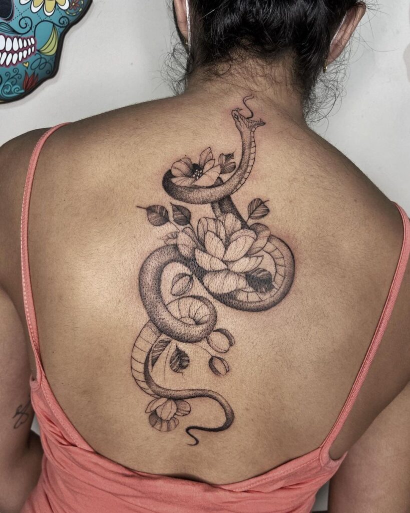 snake and flowers backpiece