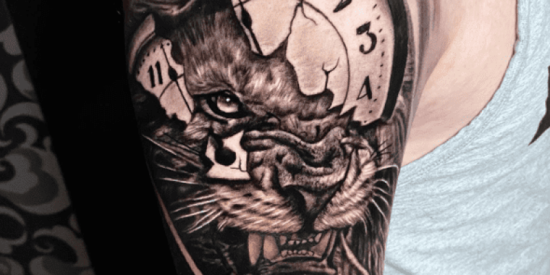 Broken-pocket-watch-tattoo-with-angry-lion