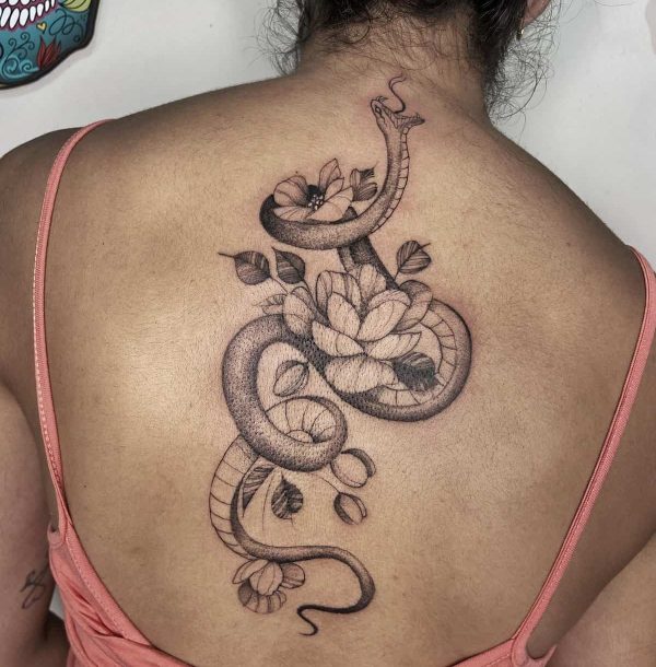 fine line snake tattoo on back