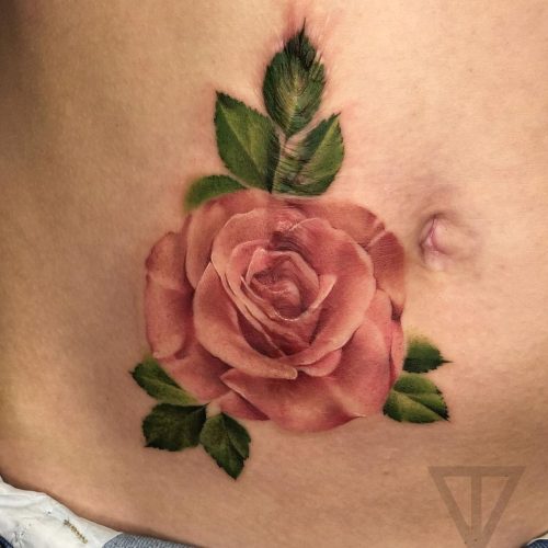 flower rose tattoo stomach scar