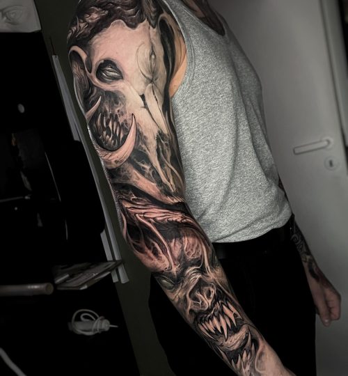 full-sleeve-tattoo-with-animal-skull