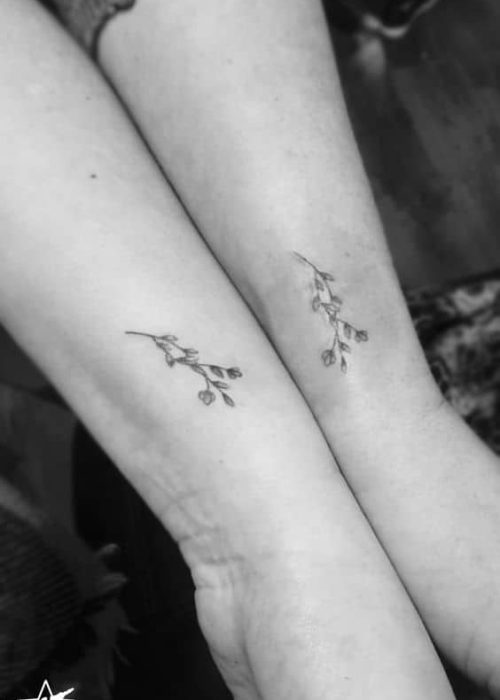 matching small flower tattoo